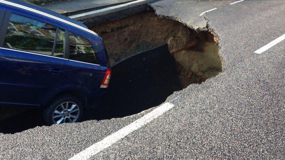 Car in hole