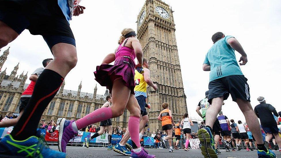 People running in front of Big Ben.