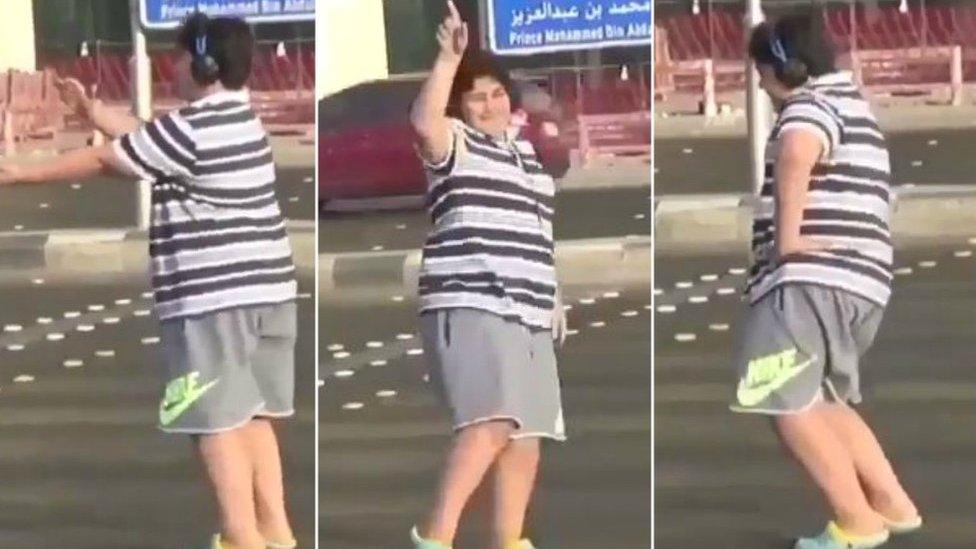 Three collaged screengrabs show a teen wearing a stripey shirt and sport shorts at various stages of doing the popular Macarena dance in a Saudi street