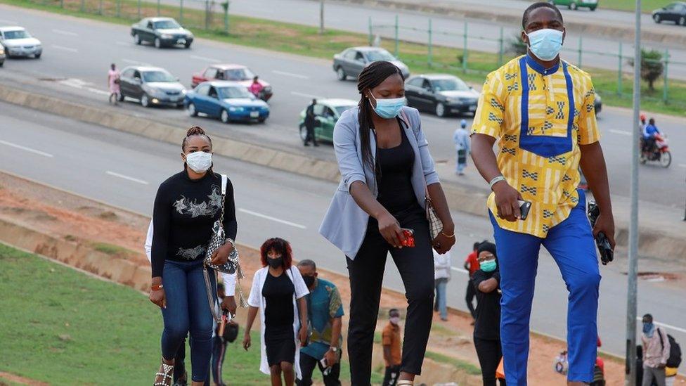 People go to work as authorities ease the lockdown following the coronavirus disease (COVID-19) outbreak in Abuja, Nigeria May 4, 2020