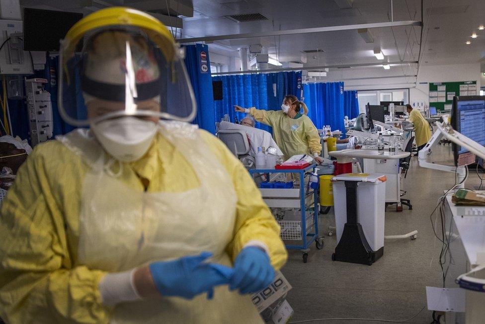 Nurses work in the Intensive Care Unit (ICU) in St George"s Hospital in Tooting, south-west London.