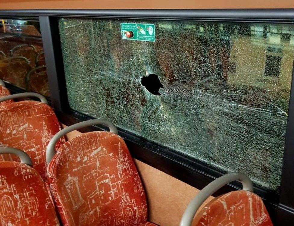 Shattered bus window