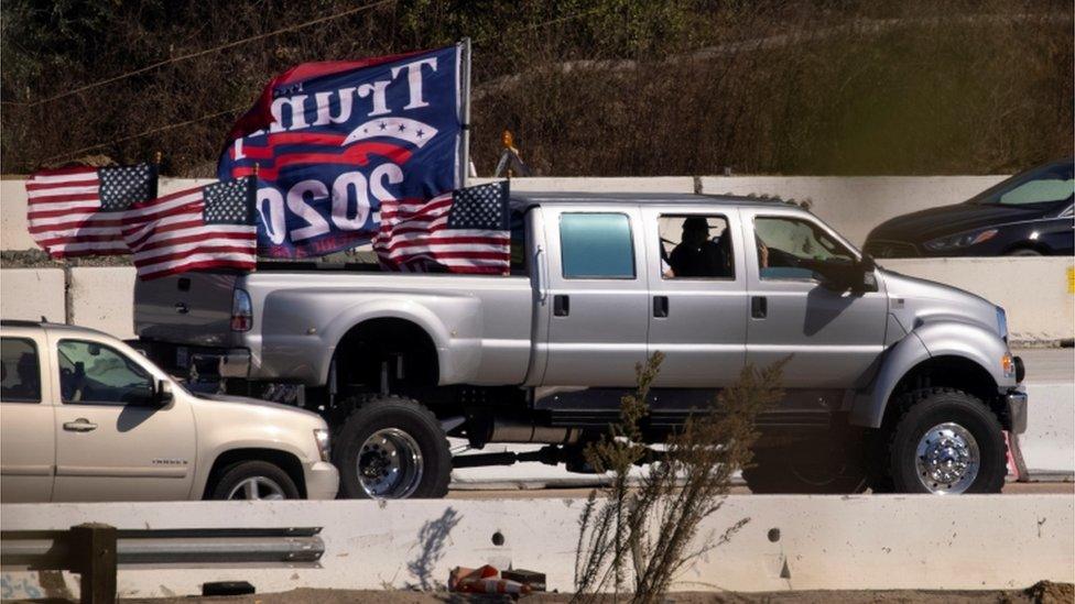 Trump supporters travelling down highway in California