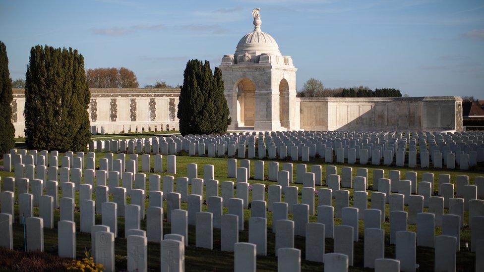 Rows of headstones stand in the late afternoon light in Tyne Cot Cemetery on April 6, 2017