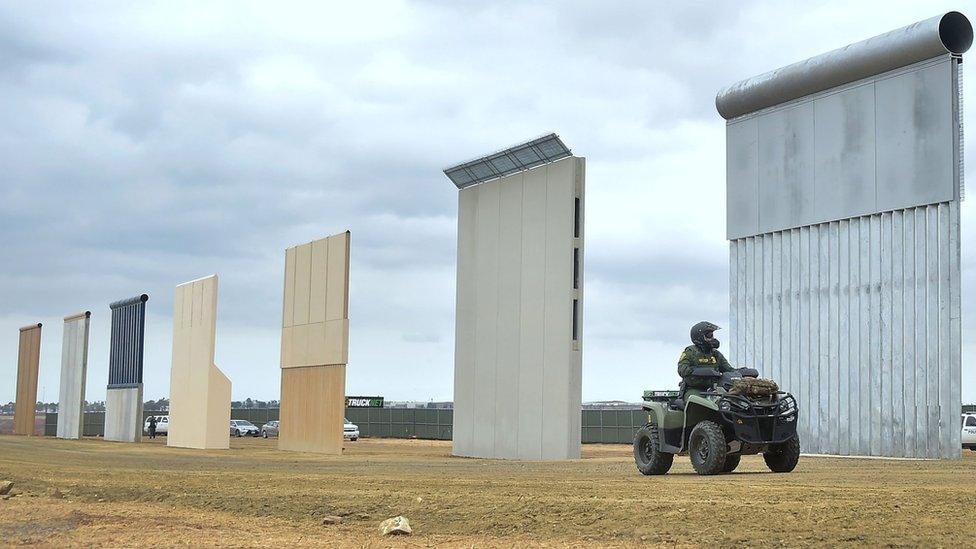 File image of a border patrol officer riding past prototypes of US President Donald Trump's proposed border wall in San Diego, California. November 1, 2017