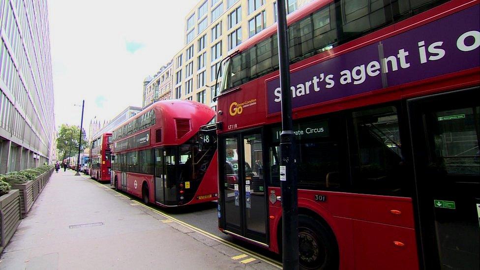 Line of Routemasters in central London