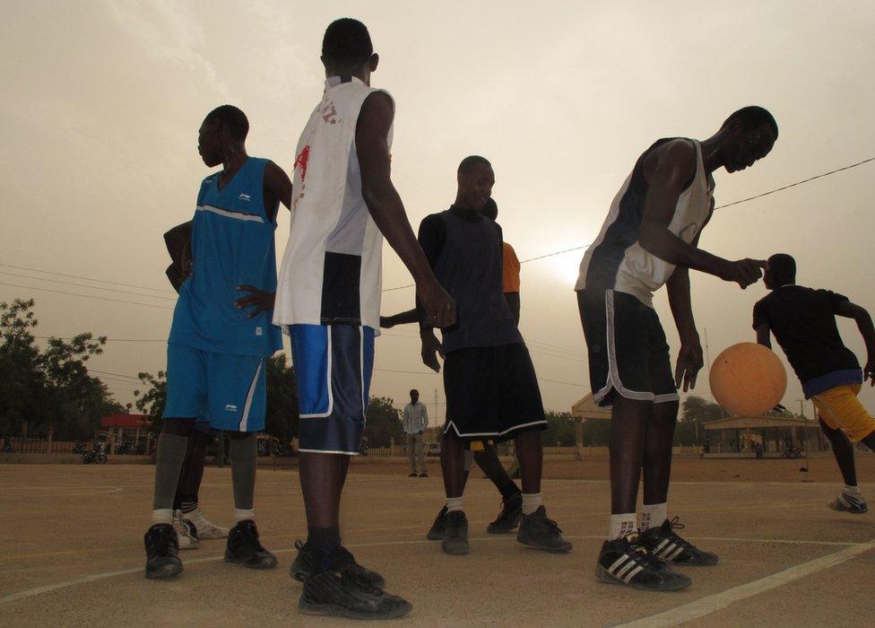 People playing basketball