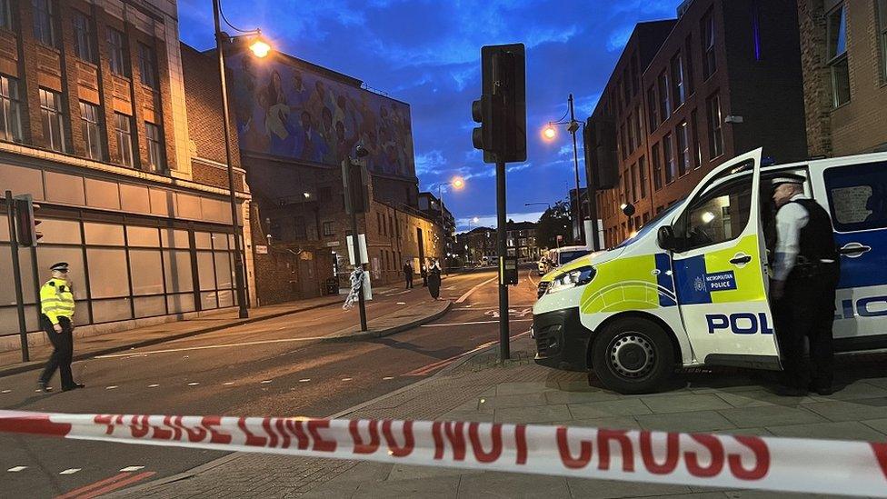 Police on Stockwell Park Walk in Lambeth, south London, following the death of a woman who died in a stabbing attack.