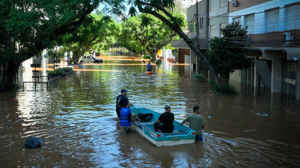 Boat on floodwater in Brazil