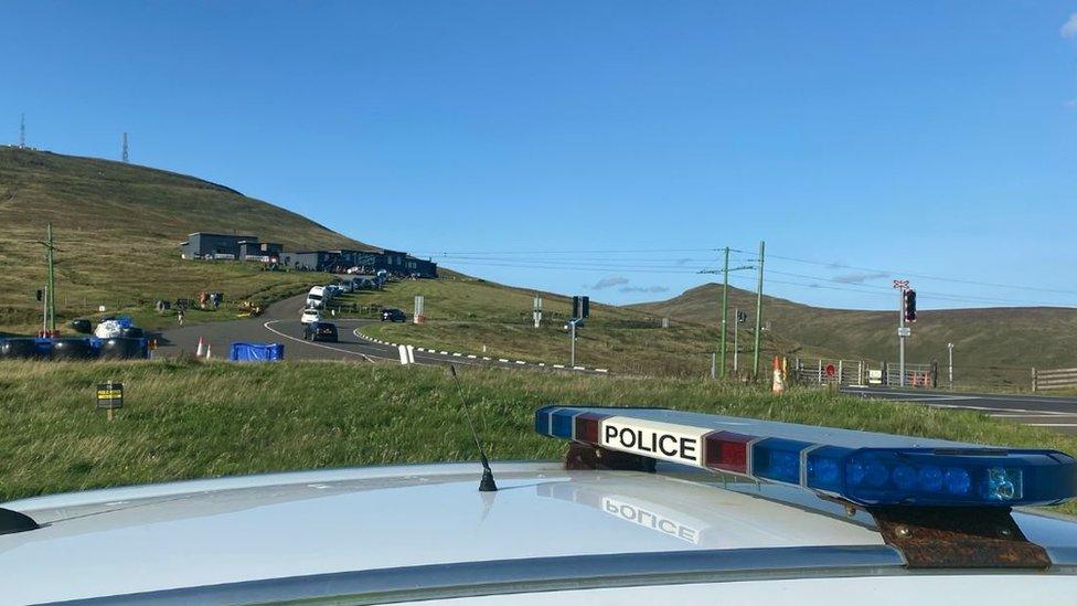 Police car on patrol on the Mountain Course