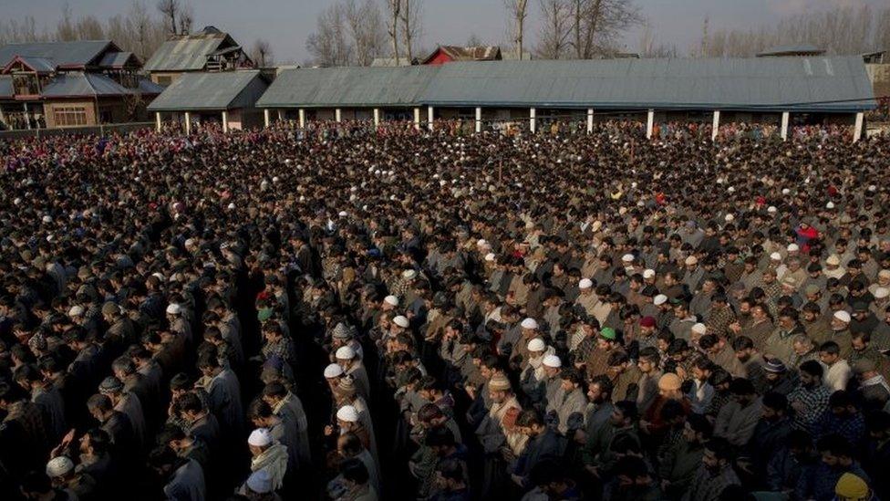 Kashmiri villagers offer funeral prayers near the bodies of suspect militants during their joint funeral procession near Frisal, 66km (40 miles) south of Srinagar (12 February 2017)