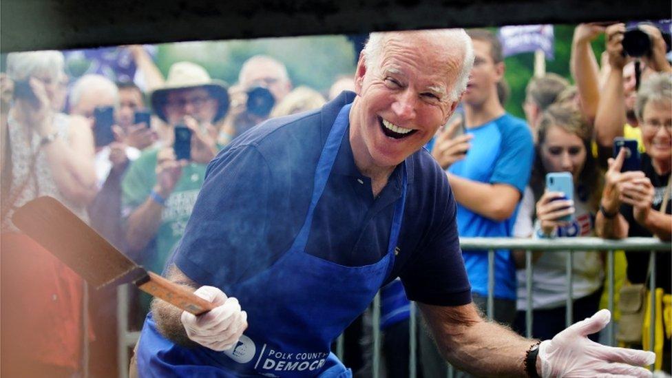 Joe Biden grilling steak at the Polk County Steak Fry