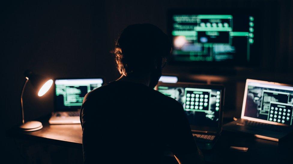 Man sitting at computer