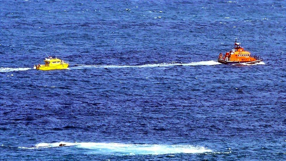 Alderney lifeboat towing Bumblebee ferry