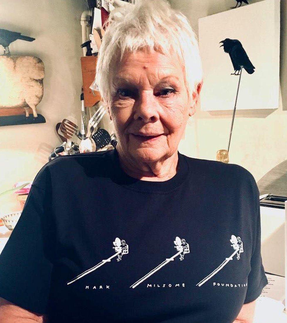 Dame Judy Dench wearing a t-shirt of the Mark Milsome Foundation