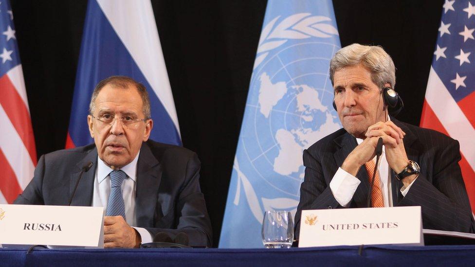 US Secretary of State John Kerry (R) listens to Russian Foreign Minister Sergey Lavrov during a press conference following a meeting of the International Syrian Support Group (ISSG) on February 11, 2016 in Munich, Germany