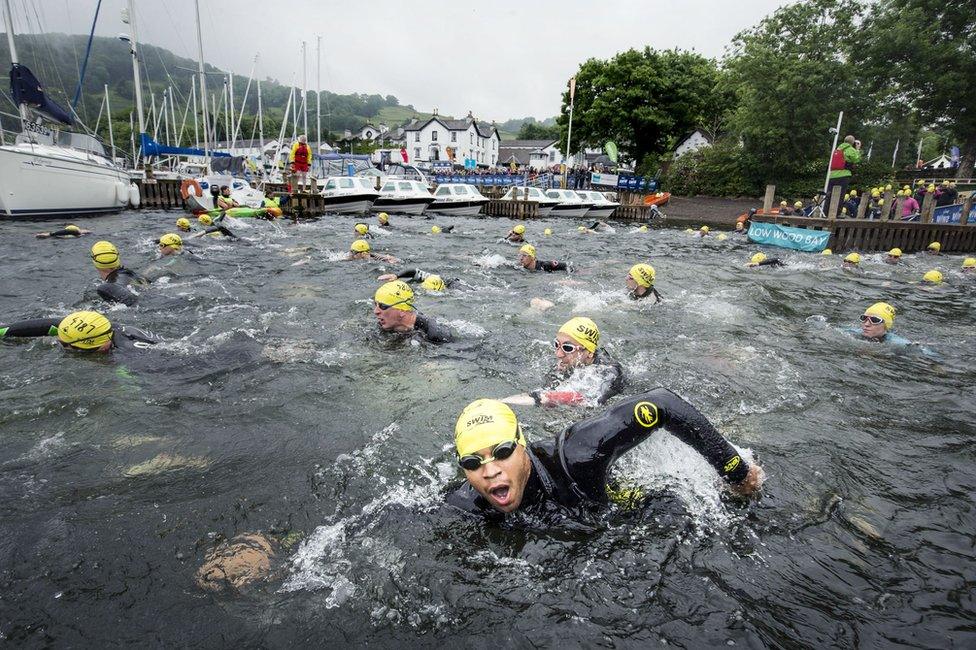 Swimmers take part in the Great North Swim on Lake Windermere in Cumbria Saturday June 11, 2016.