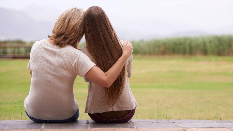 Women hugging