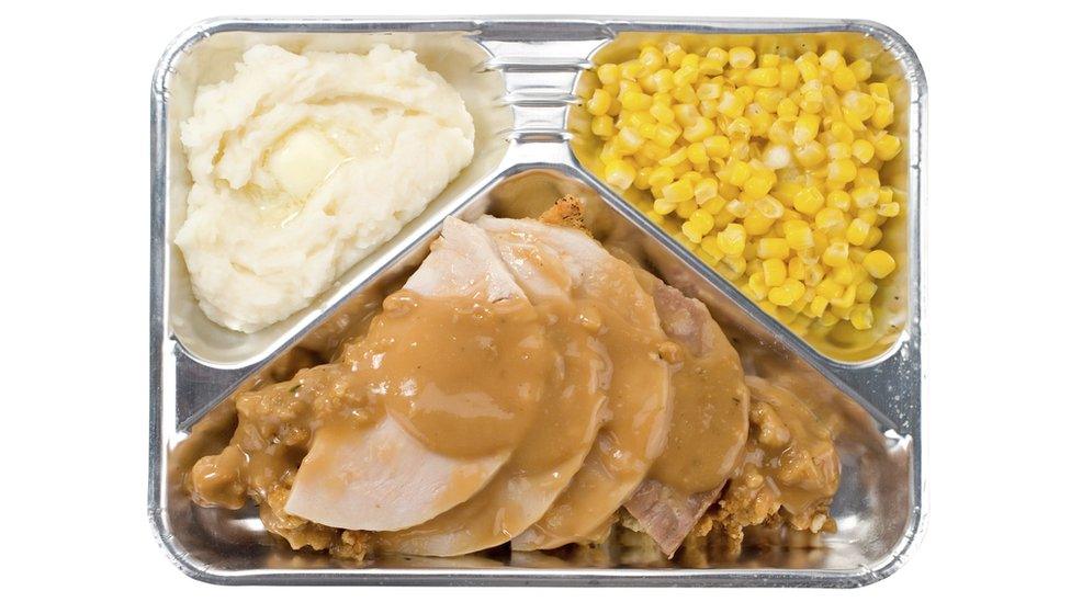 A tv dinner in an aluminium tray