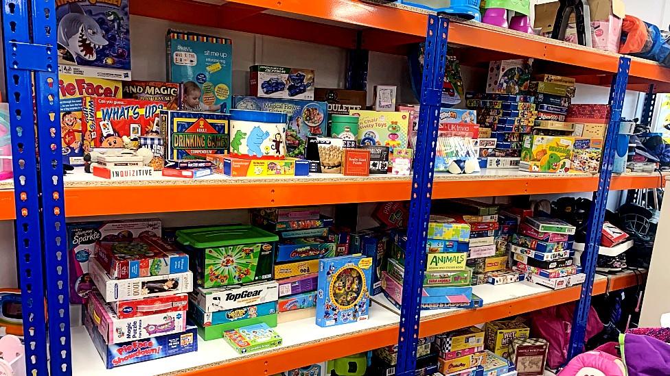 Shelves full of toys and games