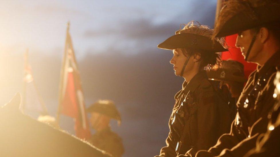 Members of the Mudgeeraba light horse troop take part in the ANZAC dawn service in Currumbin, Australia (25 April 2018)