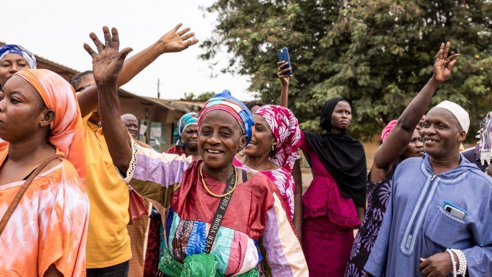 Supporters of Ousmane Sonko wait for him to vote