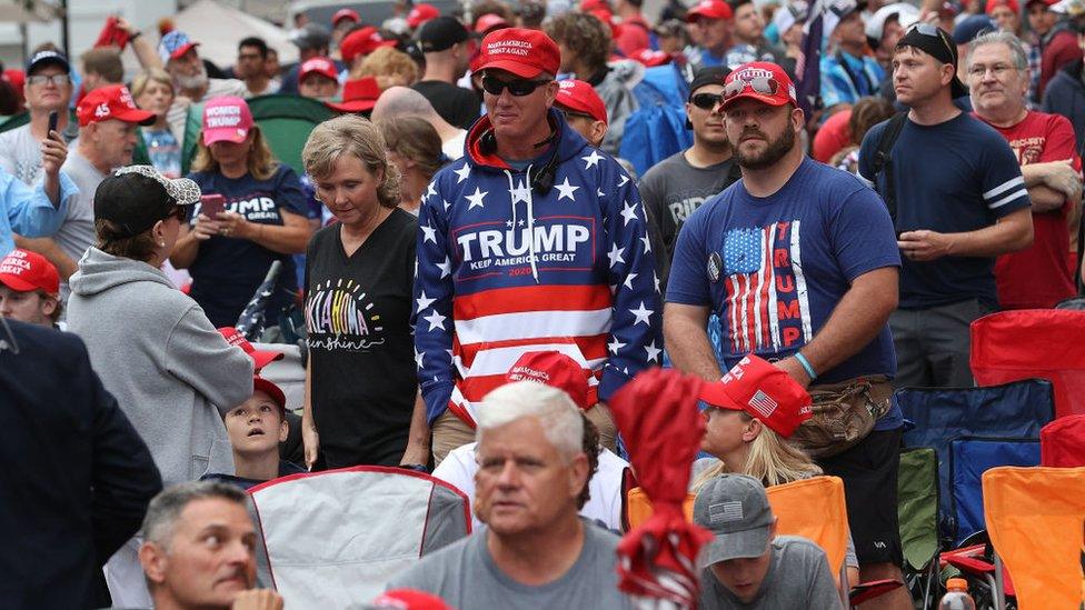 Supporters of US President Donald Trump gather to attend his campaign rally later at the BOK Center, June 20, 2020 in Tulsa, Oklahoma