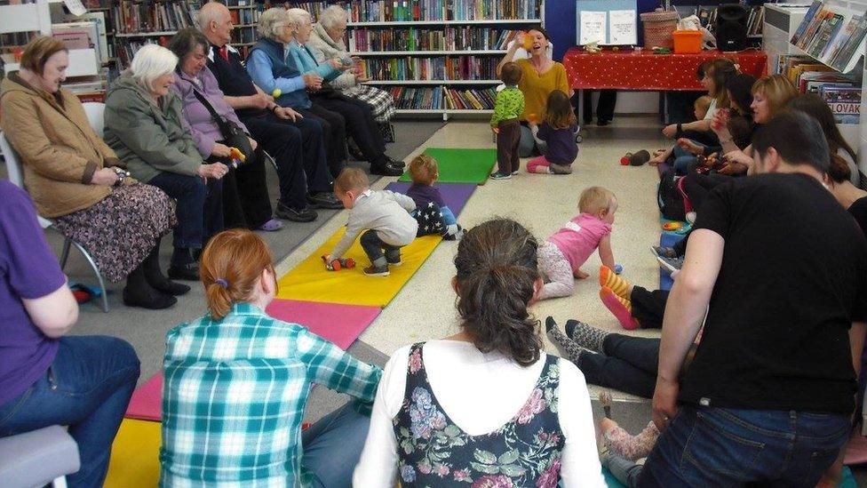 Children playing in the Family Library