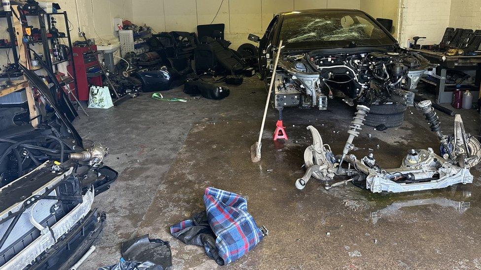 Two cars stripped of parts