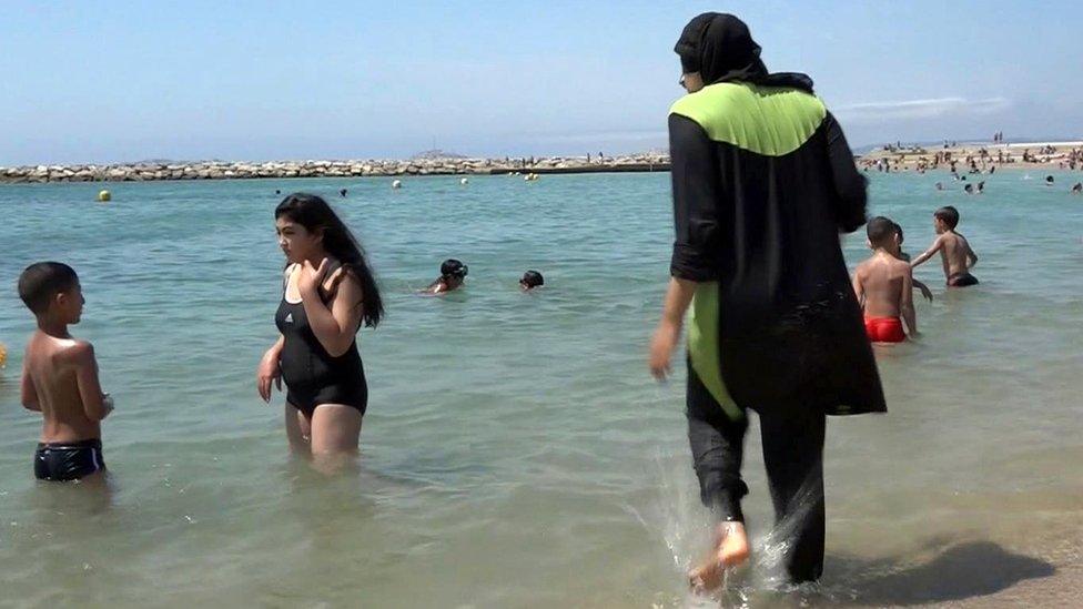 Woman in burkini bathing in Marseille - file photo