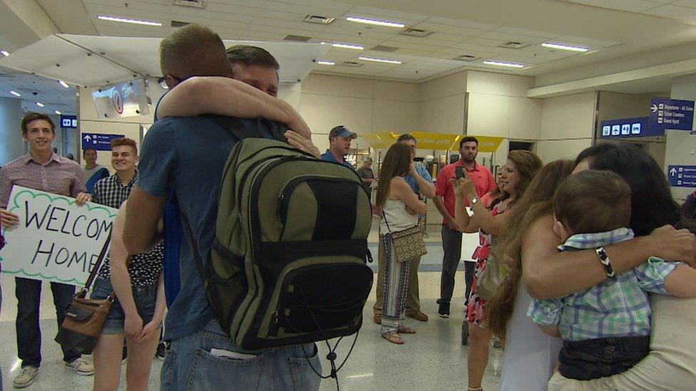 The couple's arrival in Dallas with baby Moses