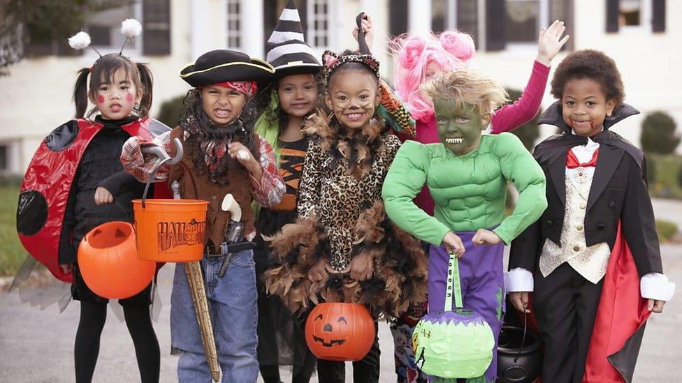 kids in halloween outfits