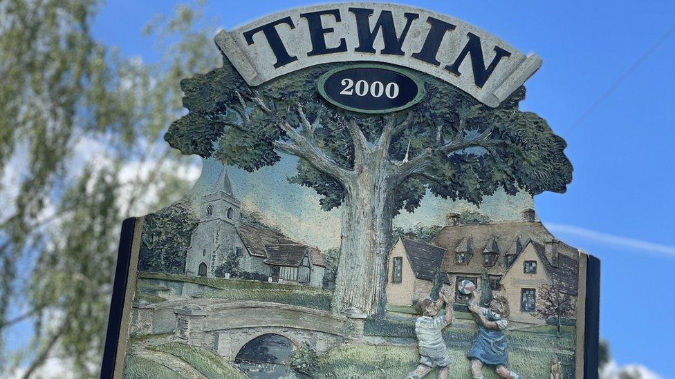 Sign for Tewin