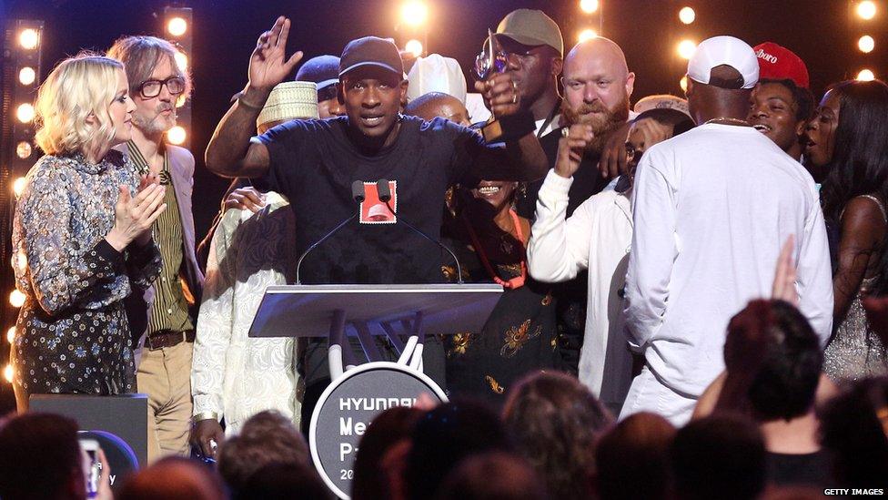 Skepta accepting the award after being announced the winner of the Mercury Prize 2016