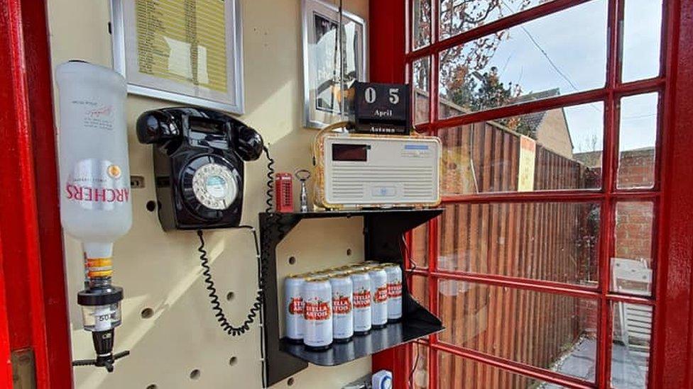 Lee Copeland fitted the kiosk with bar optics and a working telephone