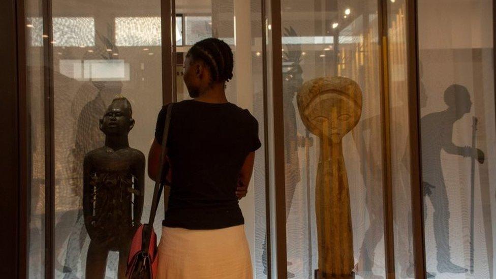 Visitors are seen in one of the exhibition rooms of the brand new National museum of the Democratic Republic of Congo in Kinshas