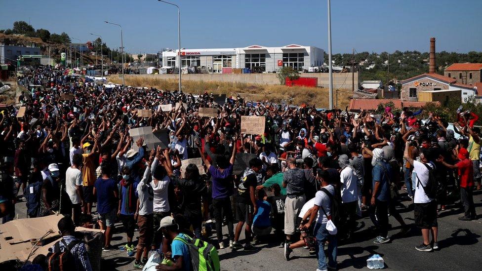 Refugees and migrants from the destroyed Moria camp protest after the news about the creation of a new temporary camp on the island of Lesbos, Greece, 11 September 2020