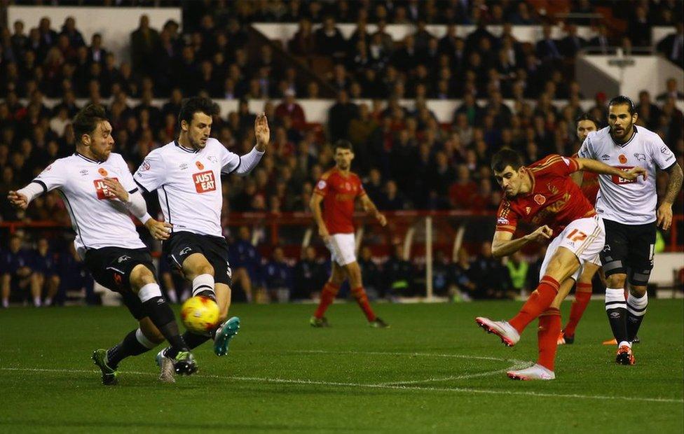Nelson Oliveira of Nottingham Forest (17) scores their first goal during the Sky Bet Championship match between Nottingham Forest and Derby County at City Ground on 6 November 2015