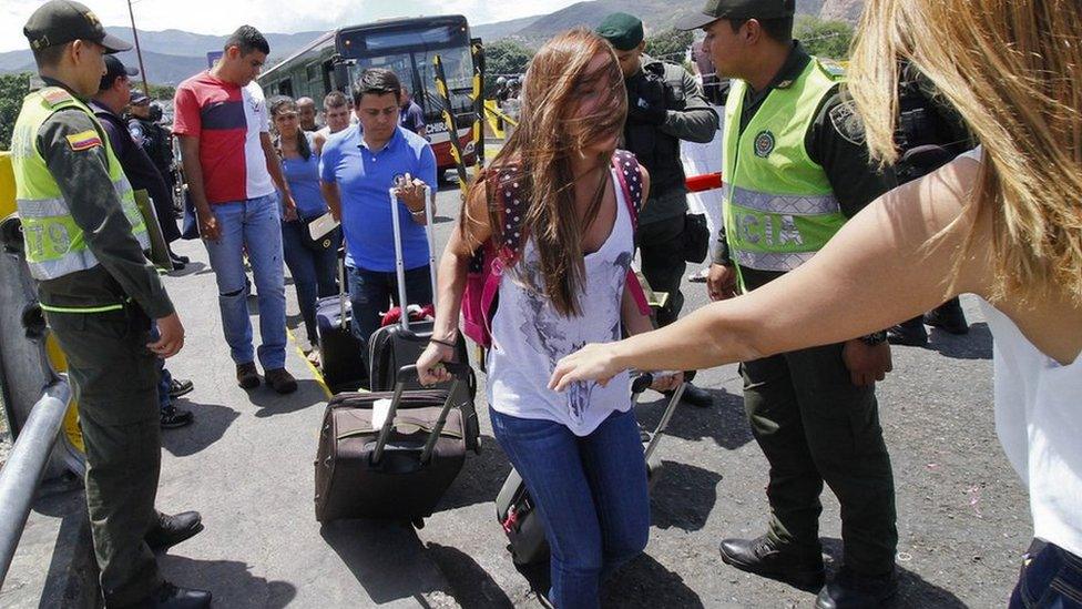 Colombians return to their home country after being deported by Venezuela