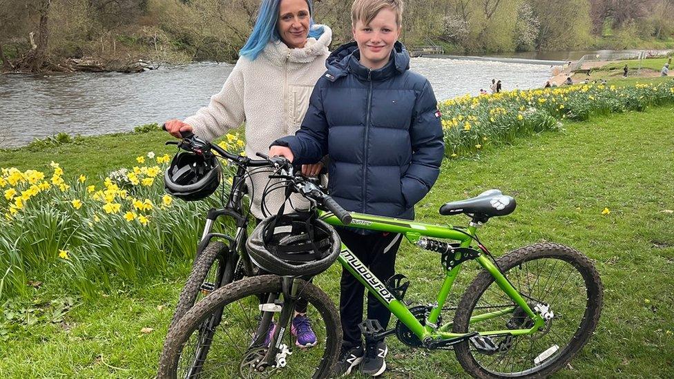 Charlie and his mum Kimberley with their bikes