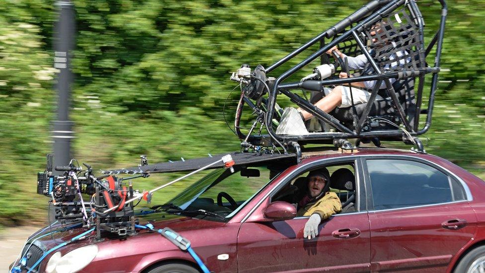 Stunt car and driving cage