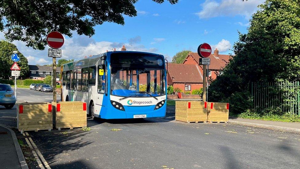 Bus driving through Vaughan Road in Exeter