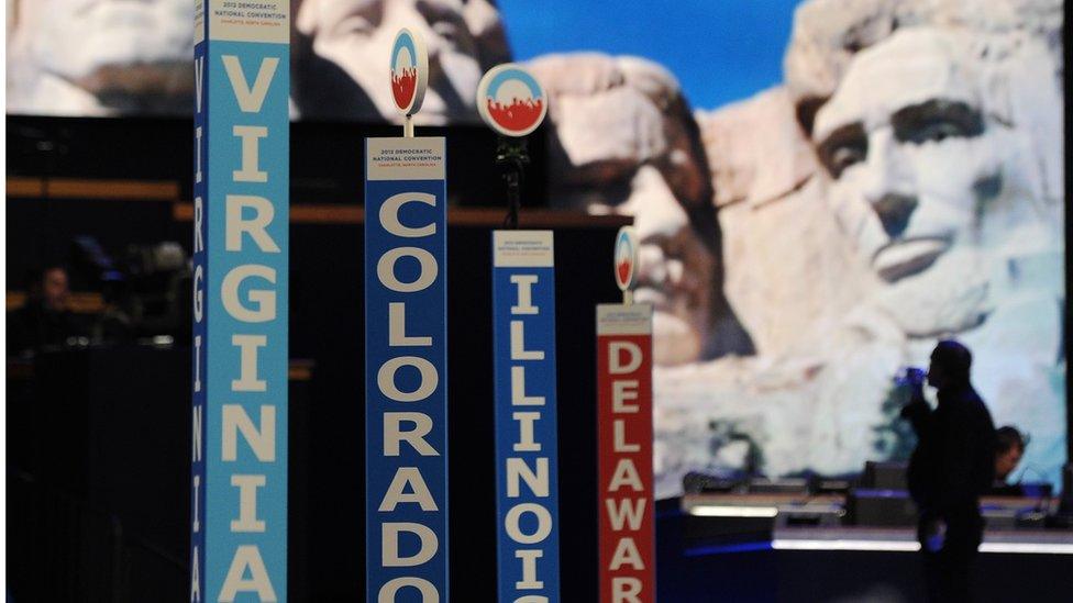 State signs on the floor of the hall at the Democratic convention in 2012