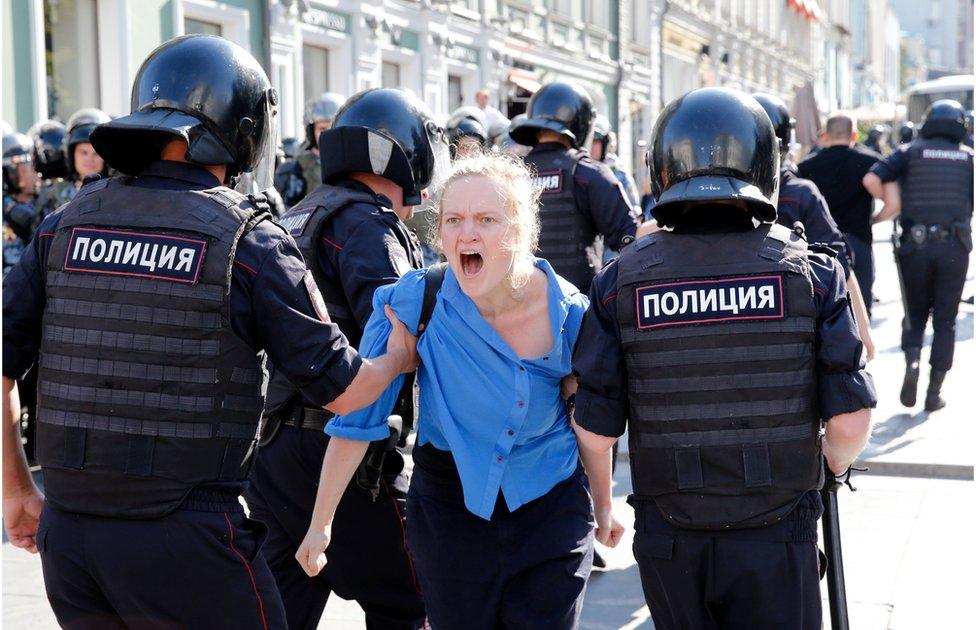 Police and protesters in Moscow, 27 July