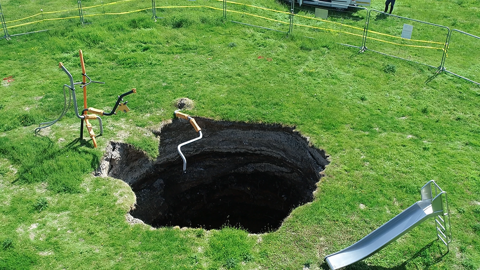 The sinkhole appeared last year on the site of a children's playground