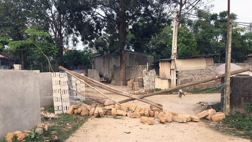 A street is blocked in Dong Tam commune, My Duc district during a land dispute protest on the outskirts of Hanoi, Vietnam 20 April 2017