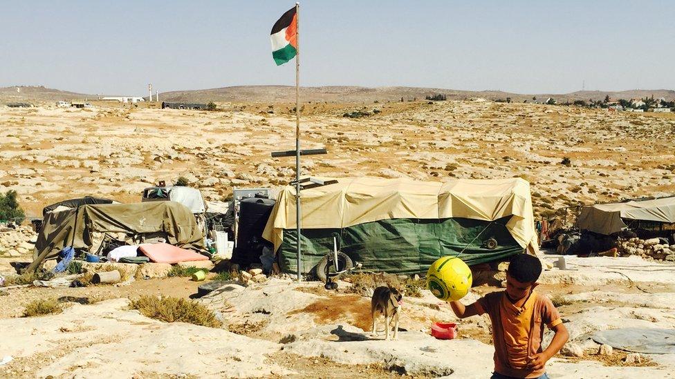 Palestinian flag and tent at Susiya