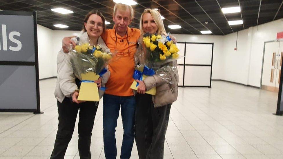 Robert Chesnaye with his wife and step daughter at Luton Airport