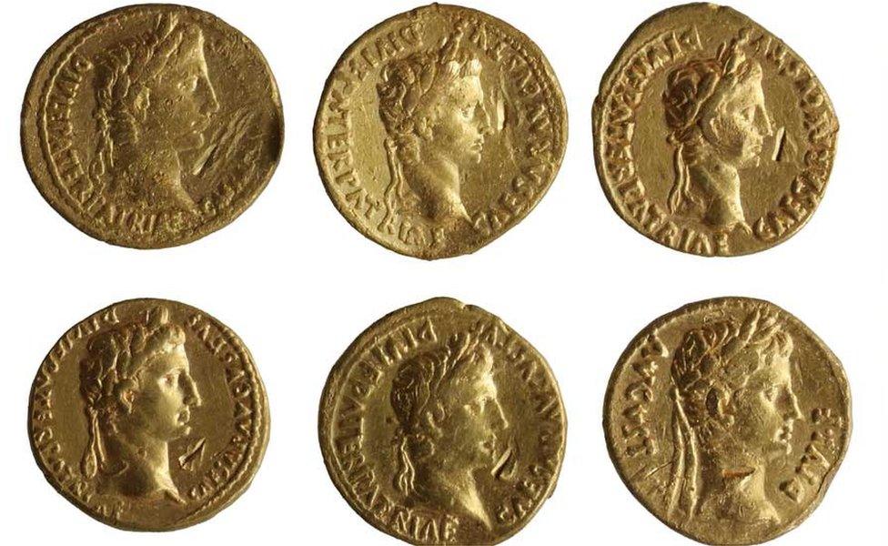 Six Roman gold coins, emperor heads