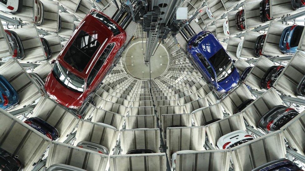 Cars of German automaker Volkswagen AG stand in one of the company's twin towers at its Autostadt customer centre